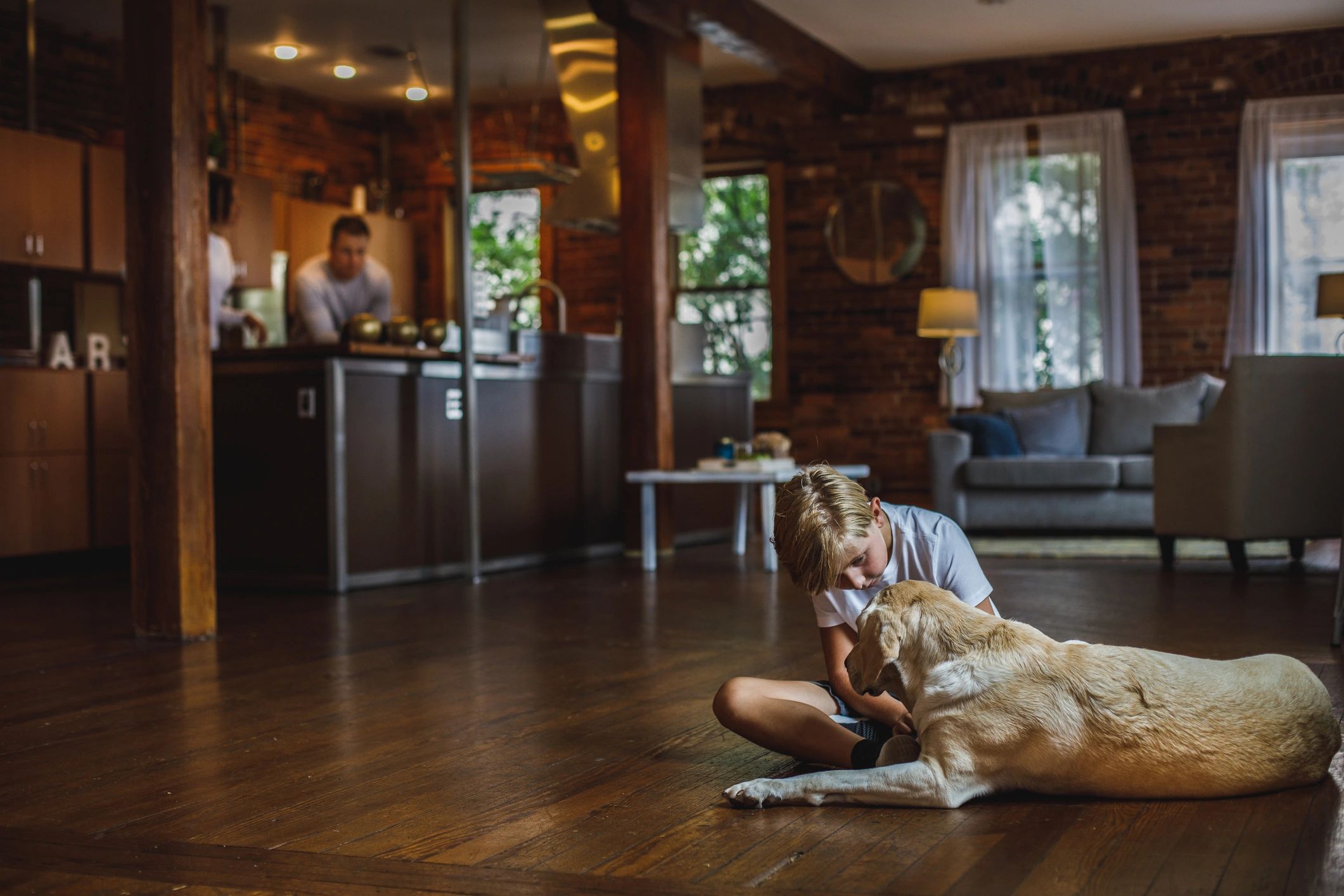 Happy family with Labrador